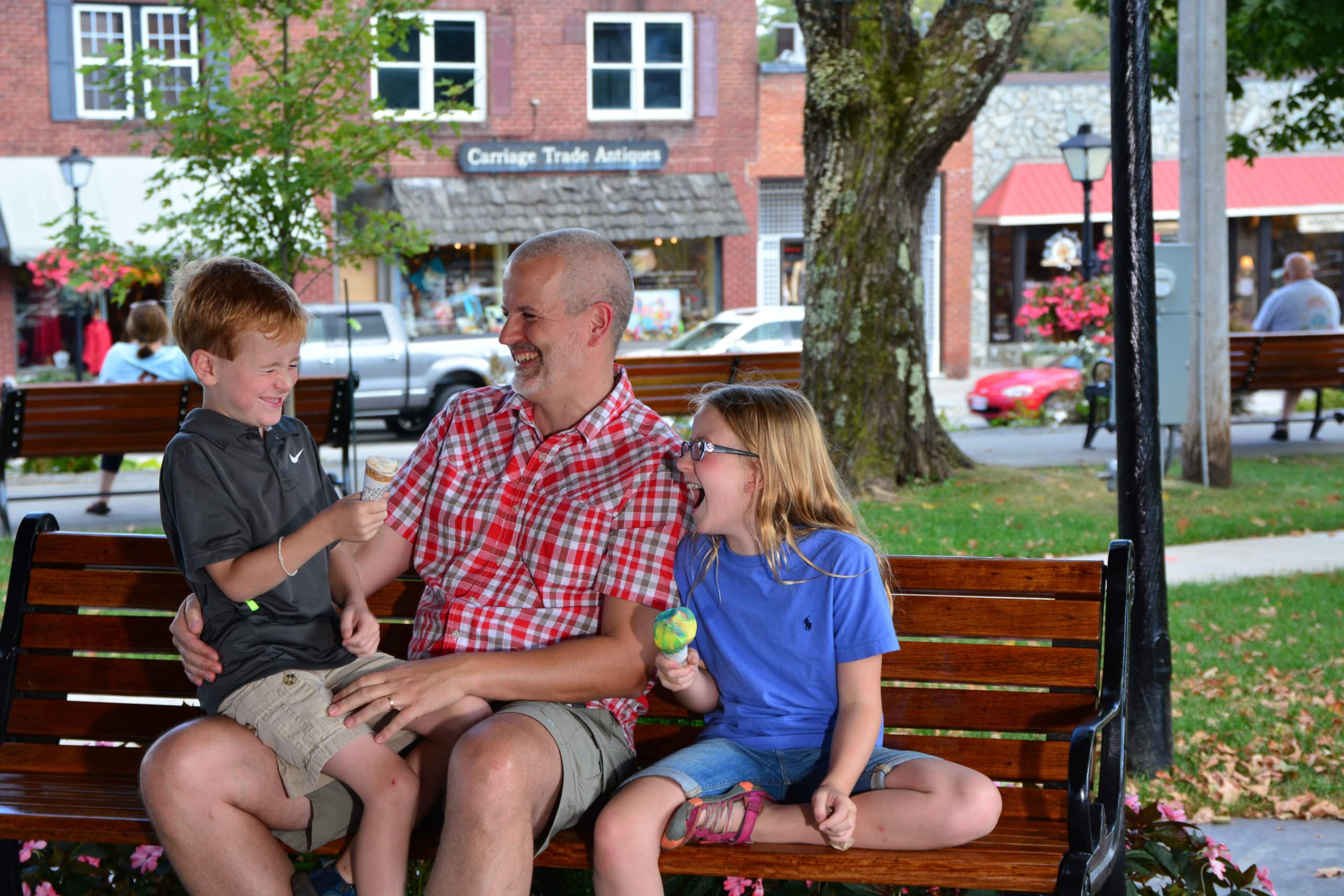 family eating ice cream in downtown blowing rock