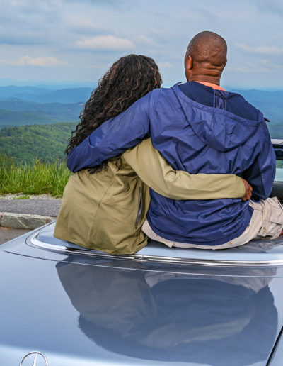 Thunder Hill Overlook view with couple in Mercedes convertible