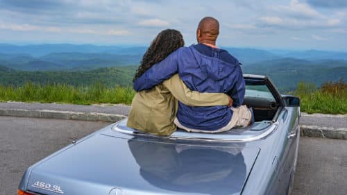 Thunder Hill Overlook view with couple in Mercedes convertible