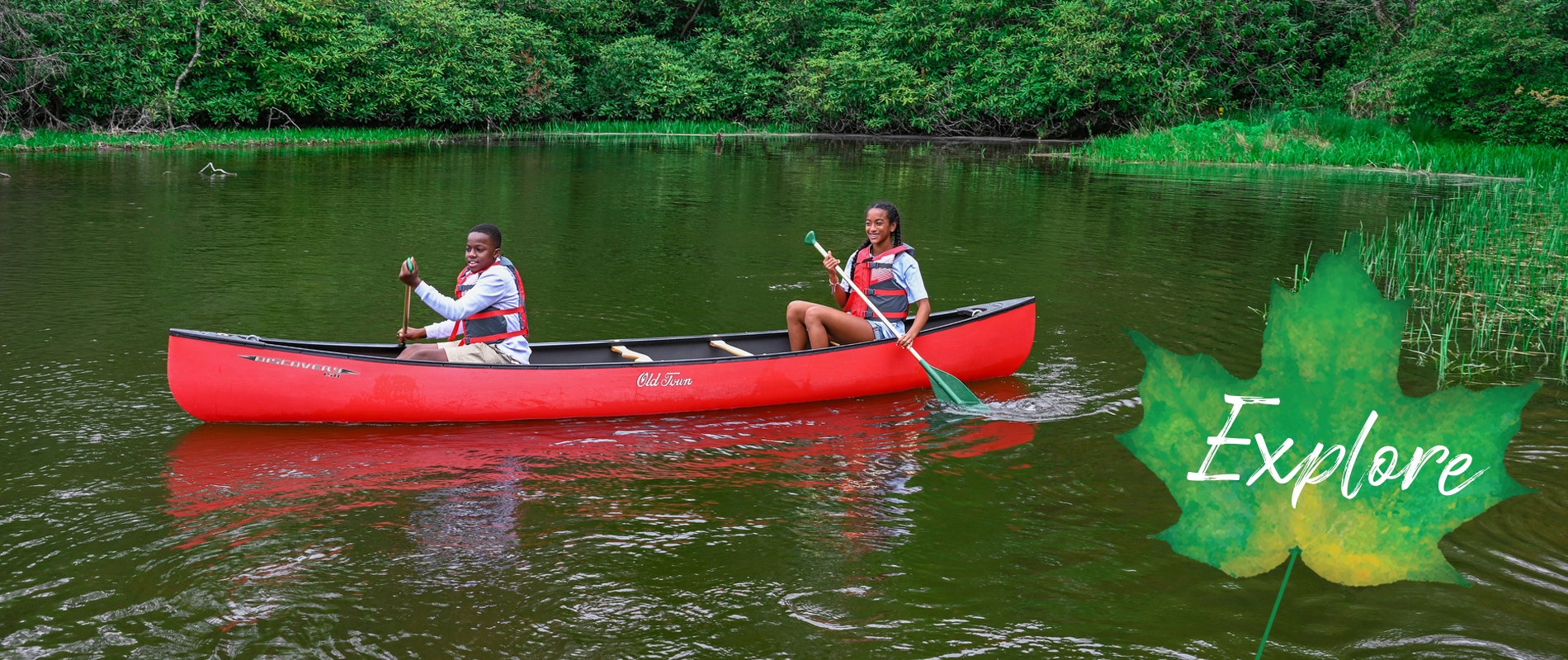 Two Teens in red canoe on Price Lake on the Blue Ridge Parkway. Click for more information about Blowing Rock Recreation