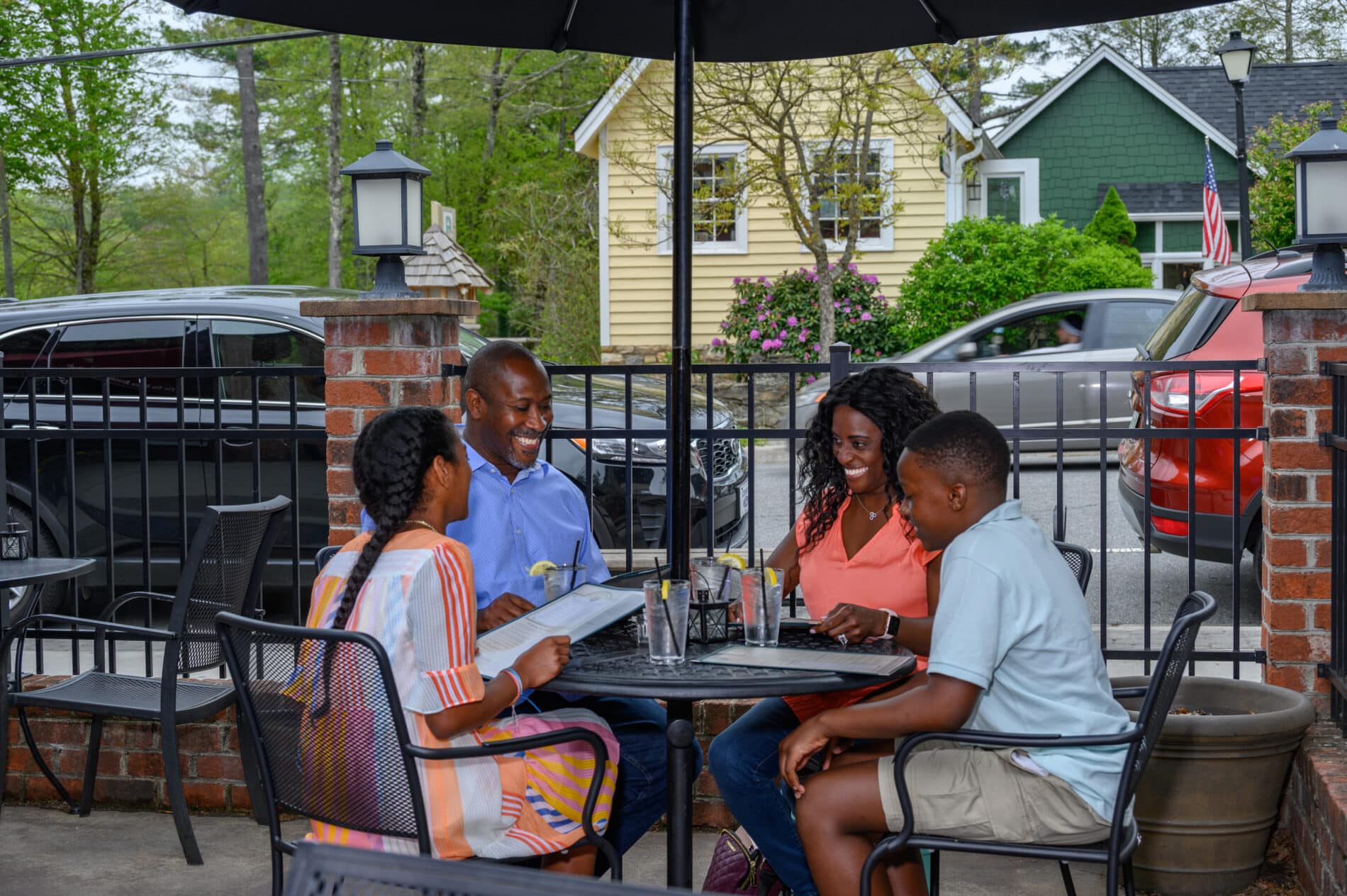 family having dinner outside in blowing rock