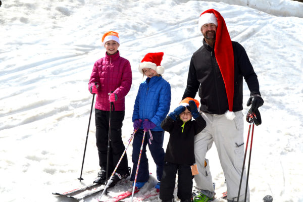 family skiing at Christmas